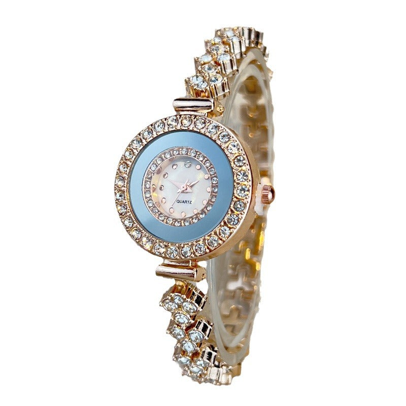 Diamond-encrusted glass rhinestone women's quartz watch with gold and blue accents