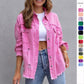 Pink ripped shirt jacket for women with distressed details and button closure