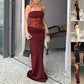 Woman wearing stylish Y2K lace suspender dress long evening party gown in burgundy color