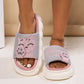 Cute gray and pink cartoon kitten home slippers for women with thick white soles and breathable fabric upper