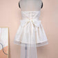 White tube top lace dress with back bow-knot and off-neck short skirt on mannequin