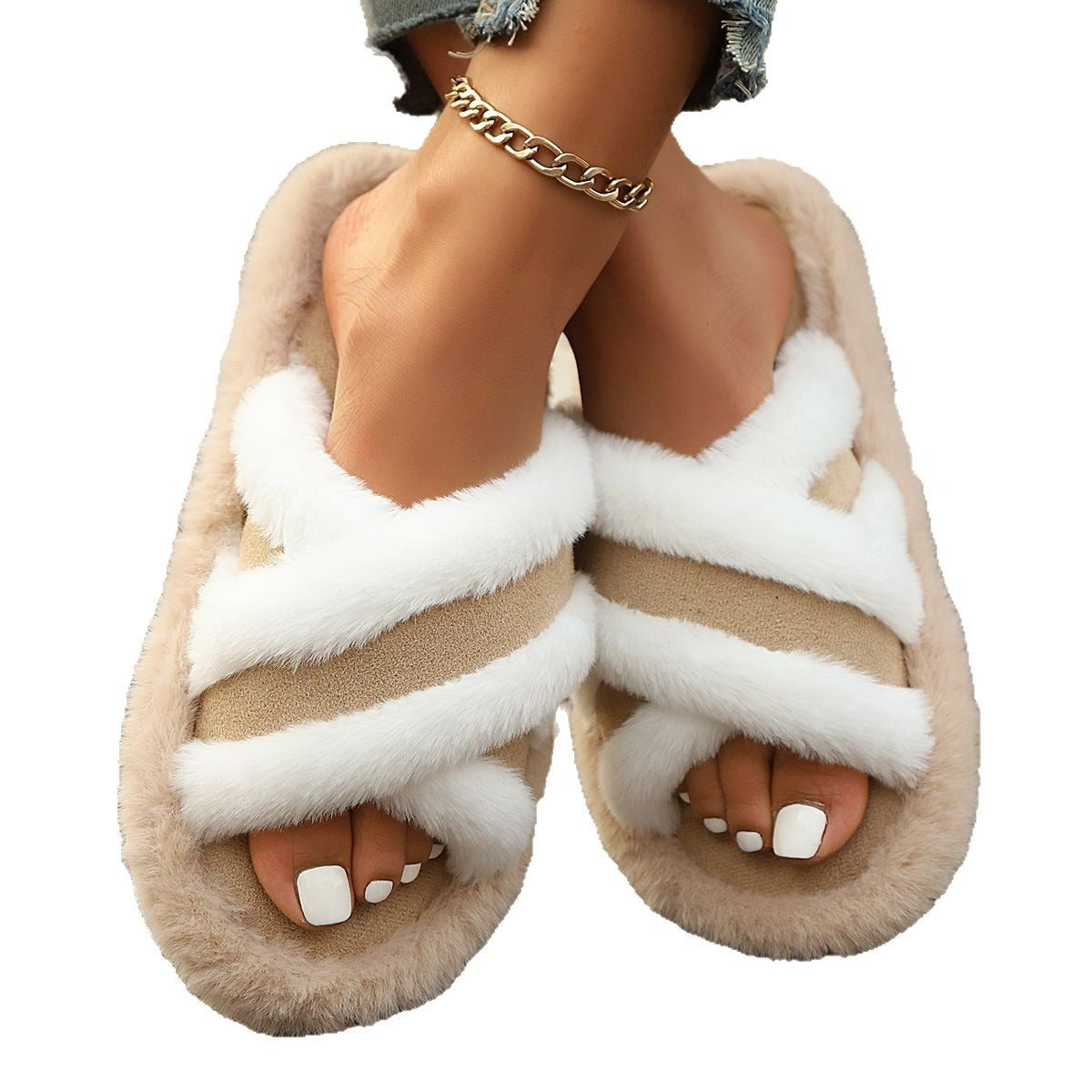 Beige fluffy slippers with crisscross white plush straps and flat EVA sole worn on feet