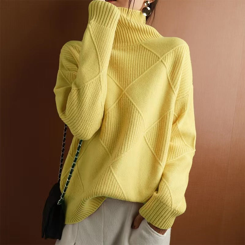 Loose high collar warm yellow knitted sweater for women with 3D effect and thick acrylic fabric