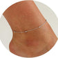 Silver beach anklet with small beads on ankle chain