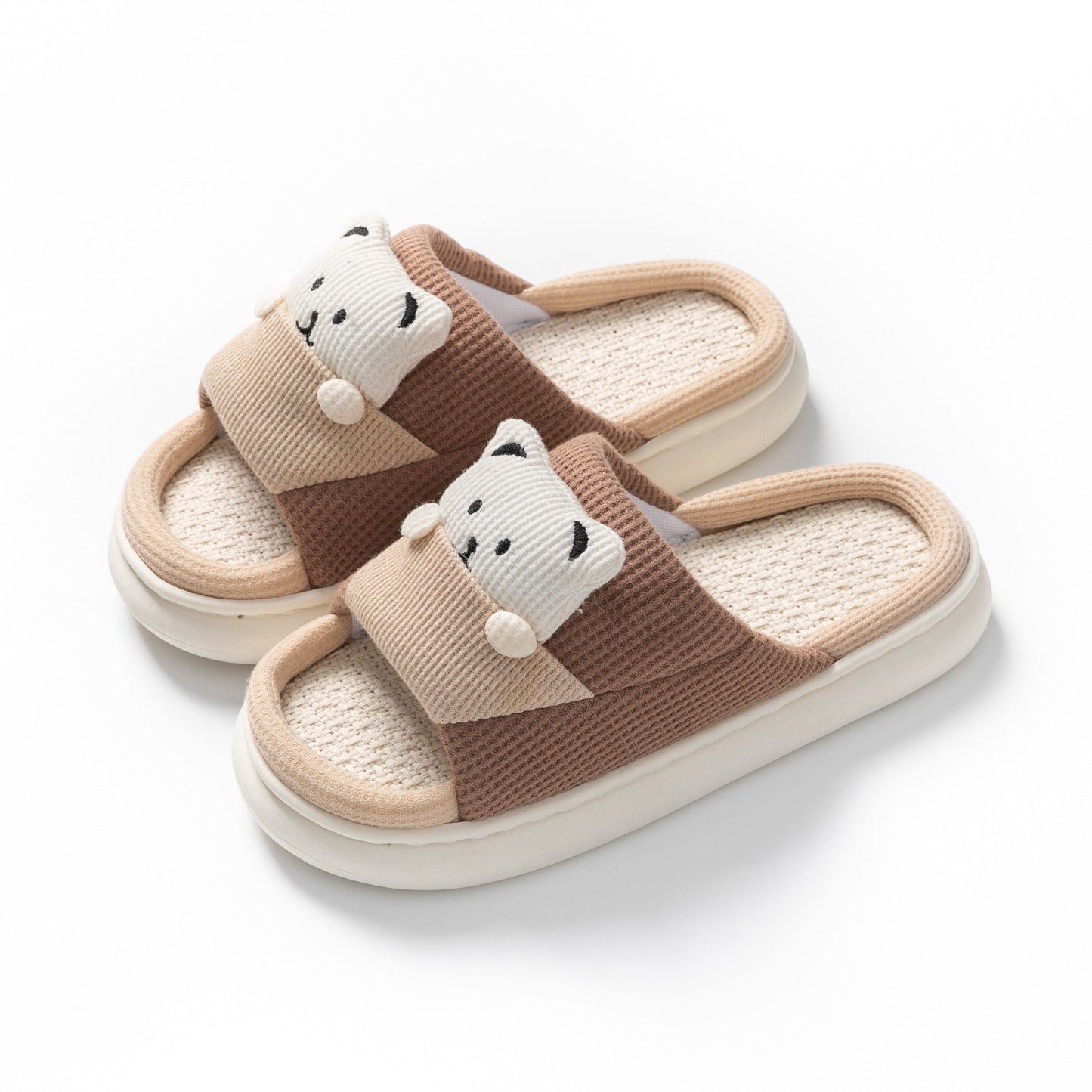 Cute cartoon bear slippers with thick soles, mute linen, and ergonomic design for women’s spring and autumn house shoes.
