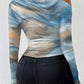 Women’s apricot print long sleeve t-shirt with asymmetrical neckline and ruched slim fit design