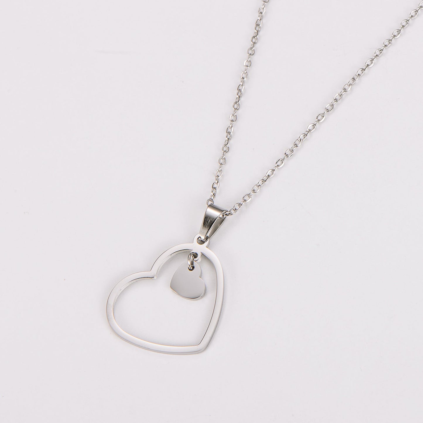 Double-heart stainless steel minimalist necklace with O-link chain in silver tone