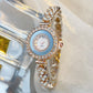 Diamond-encrusted glass rhinestone women's quartz watch in rose gold with sparkling band