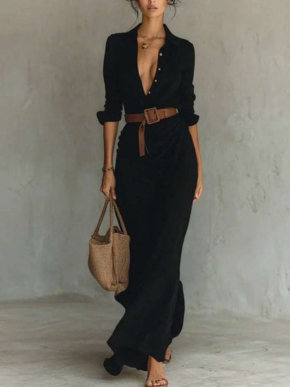Elegant black irregular long dress with belt and button lapel, long sleeves, perfect for daily office wear