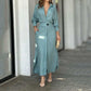 Women's elegant tied solid color waisted long-sleeved sky blue shirt dress with pockets and asymmetric skirt
