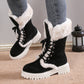 Women’s winter lace-up snow boots with black suede, white plush fleece lining, and chunky medium heels