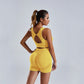 Woman wearing yellow seamless yoga set women's vest and high waist shorts sportswear gym outfit