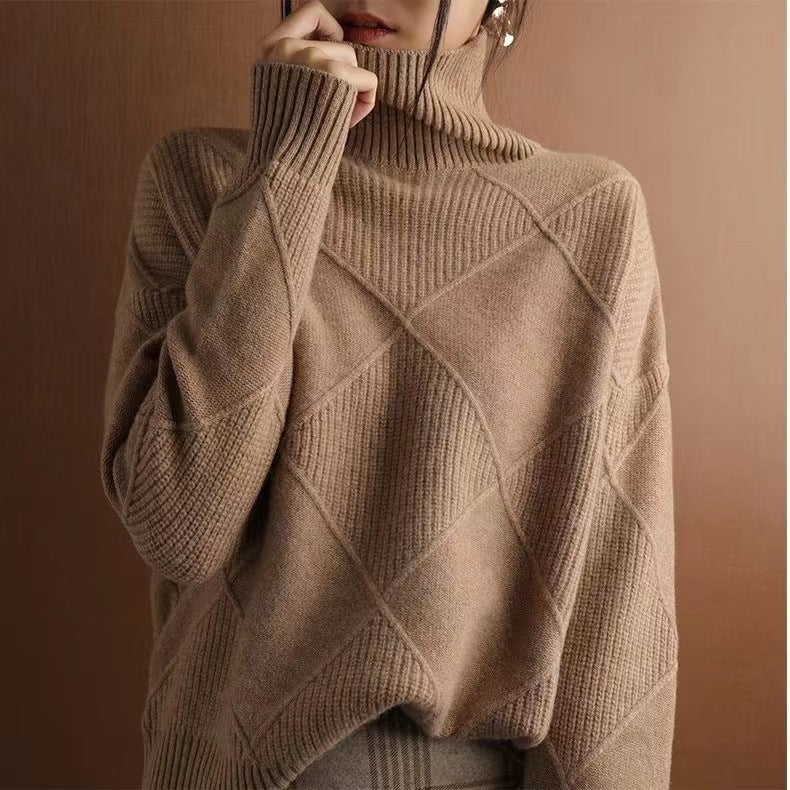 Loose high collar warm knitted sweater for women in beige solid color