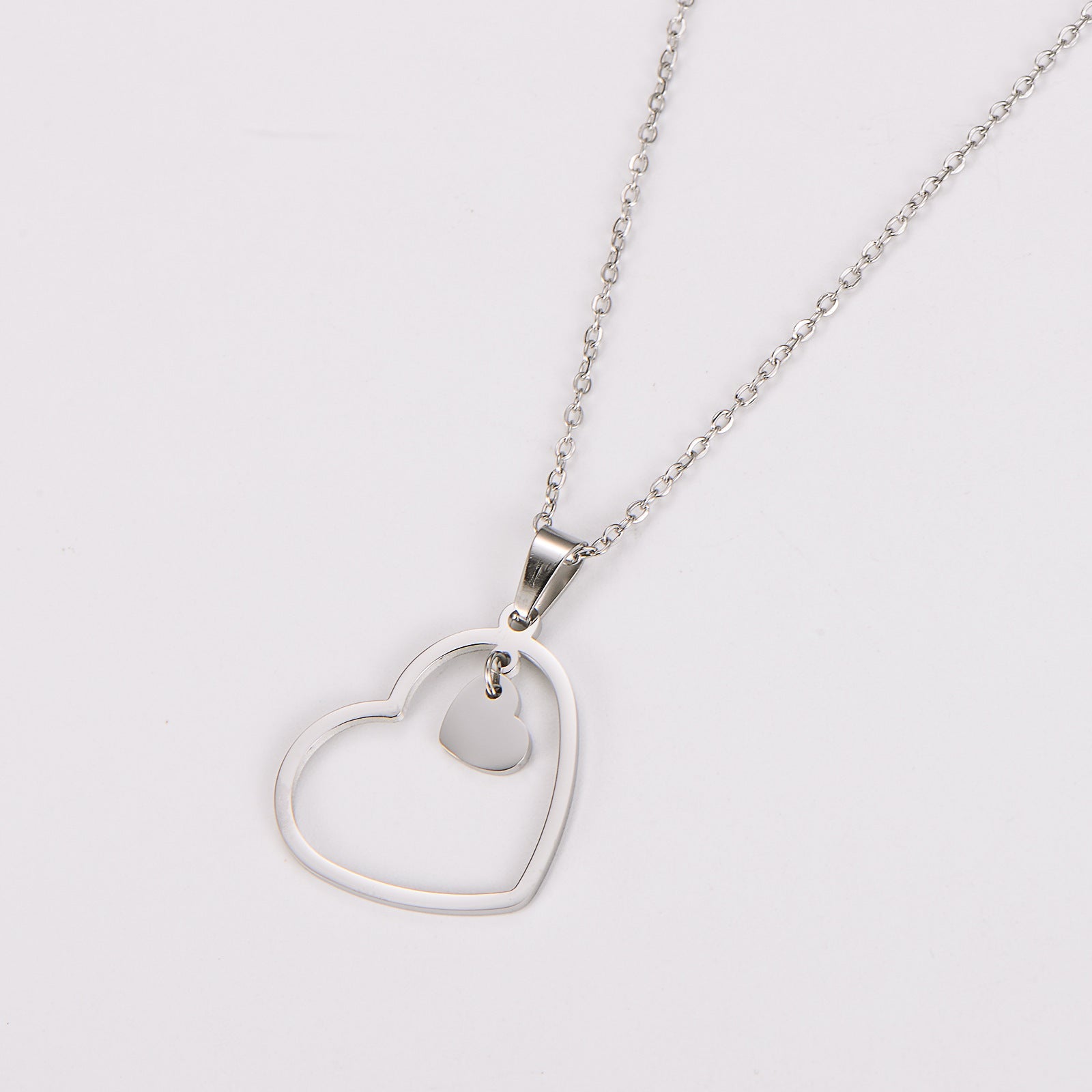 Double-heart stainless steel minimalist necklace with O-link chain in silver color