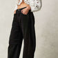High stretch mid-rise black wide leg baggy denim jeans for women