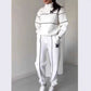 Women 2 piece white lounge sweatsuit set with black stripes and M logo