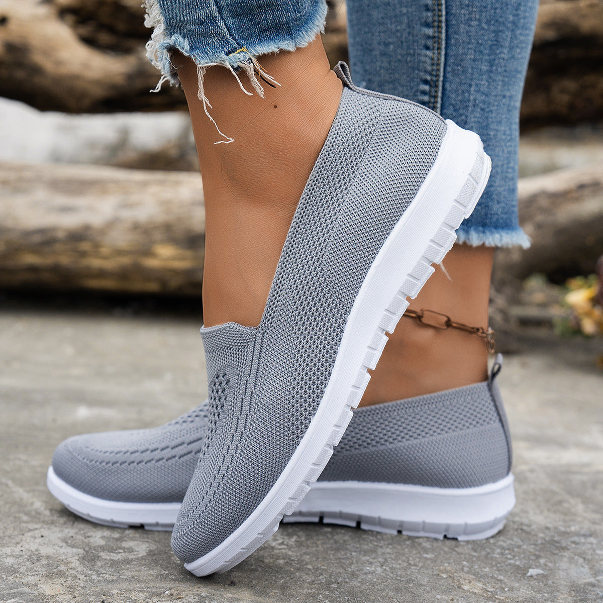 Light gray women's mesh slip-on casual summer shoes with white soles
