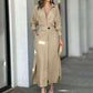Women's elegant beige tied waist long-sleeved shirt dress with pockets and asymmetric hem