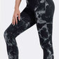 Seamless tie dye leggings for women in black and white, perfect for yoga and fitness.