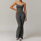 Women wearing Solid Beauty-back long pants jumpsuit in gray for yoga and fitness