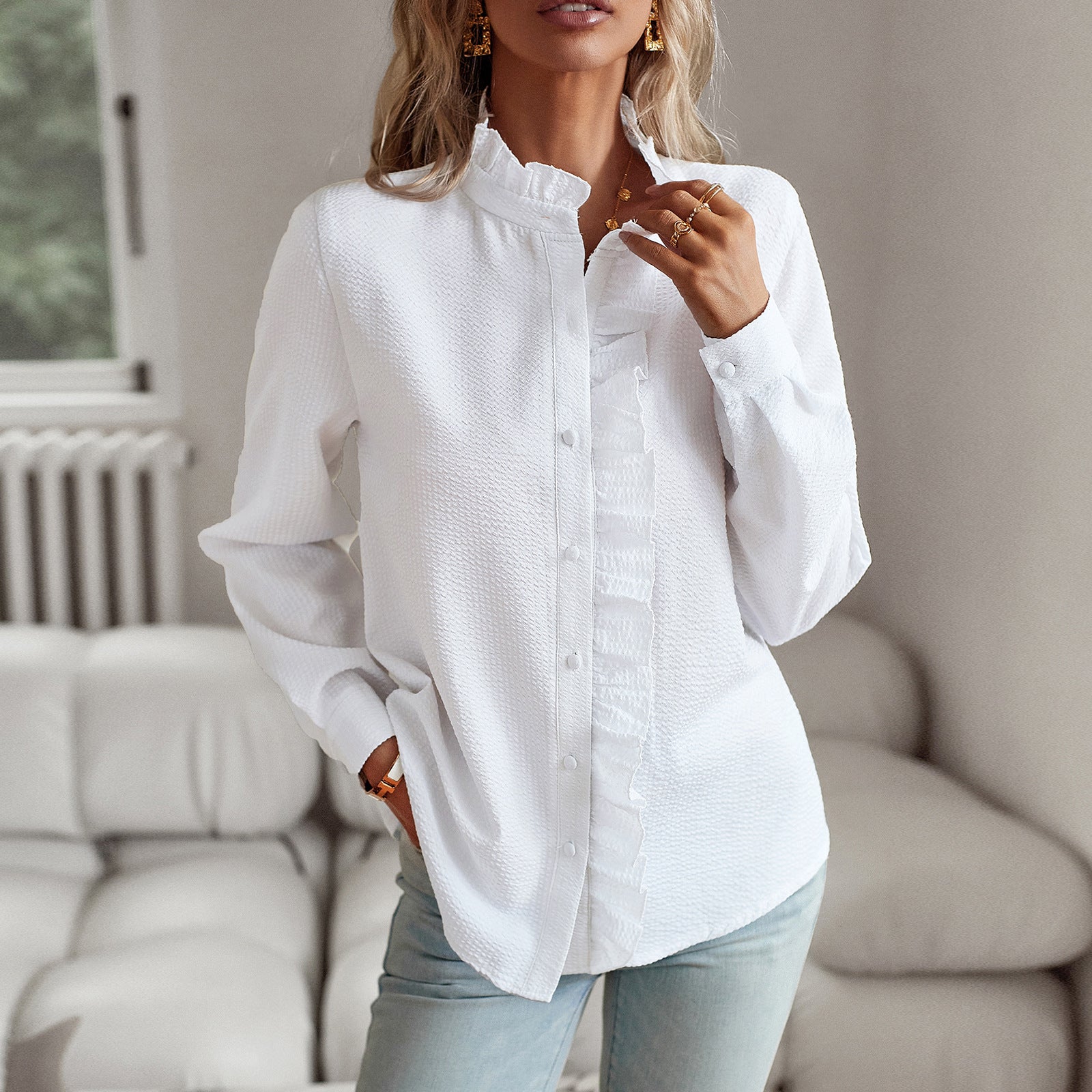 Elegant white striped long sleeve shirt with ruffle design and button-up front for casual office wear