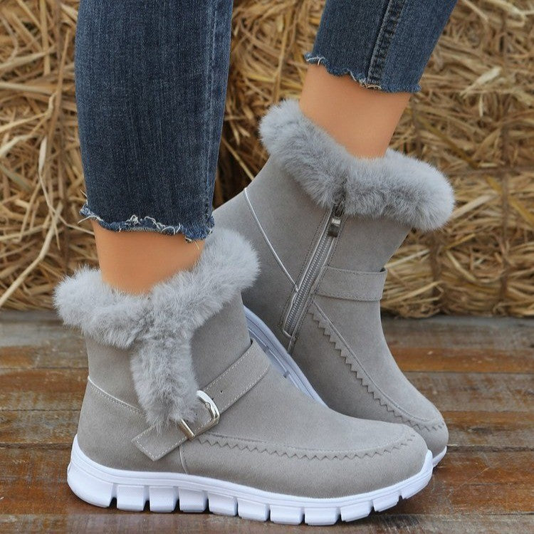 Women's grey winter snow boots with plush fur lining and buckle design