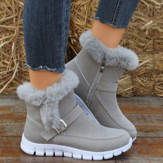 Women's grey winter snow boots with plush fur lining and buckle design