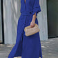 Women's elegant tied solid color waisted long-sleeved shirt dress in blue with asymmetric skirt and high waist design