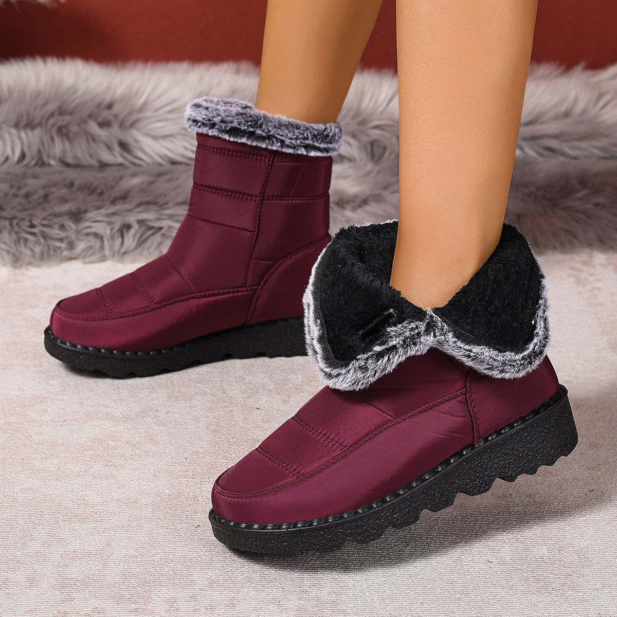 Plus size women's maroon snow boots with warm fur lining and flat black polyurethane soles
