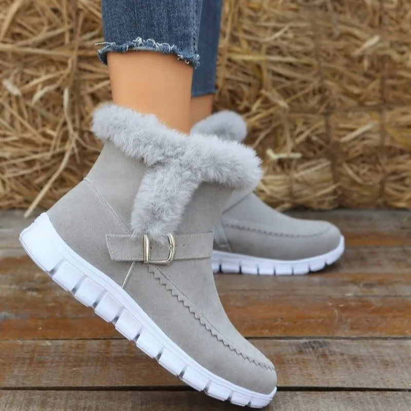 Women's gray winter snow boots with plush lining and buckle design