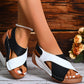 Women wearing black and white colorblock cross-strap summer wedges sandals with thick rubber sole and round toe