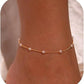 Gold beach anklet with small pearls on ankle chain