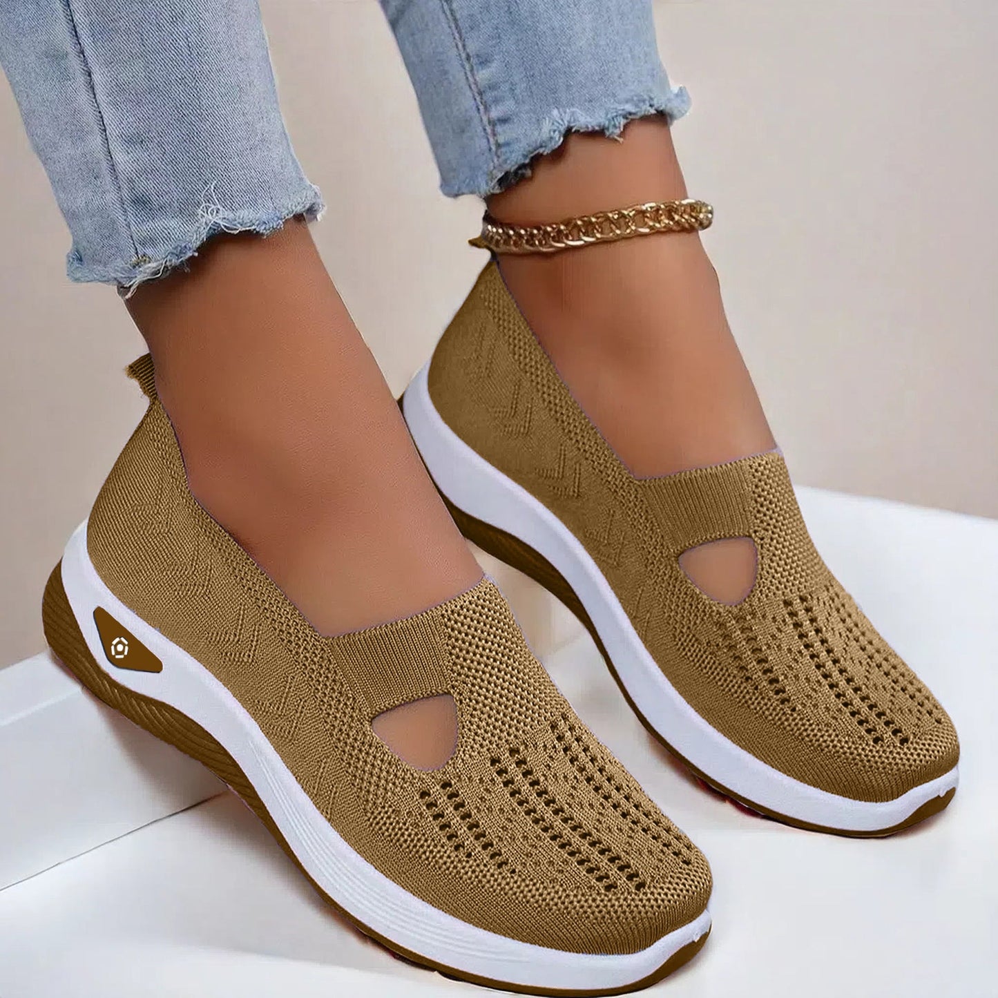 Women’s breathable mesh flats shoes in brown with white non-slip soft sole, casual style.